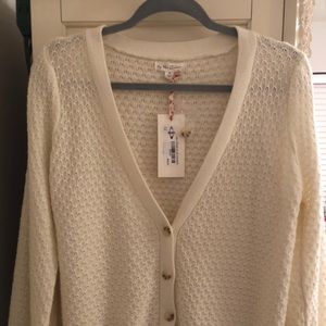 Cream cardigan with tortoise buttons